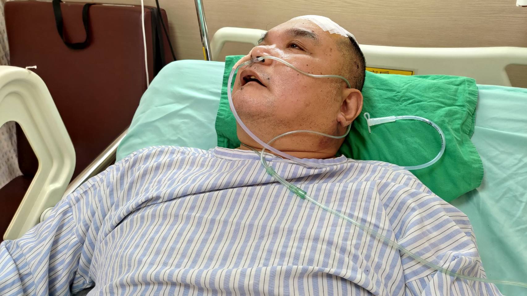 陳世榮因腦中風癱瘓,現於機構照護安置。(圖:阿煌提供) 陳世榮因腦中風癱瘓,現於機構照護安置。(圖:阿煌提供)